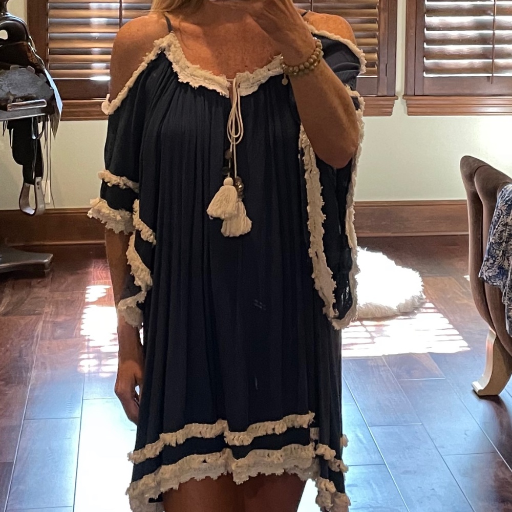 beautiful RAGA drop shoulder with detail fringe and tassels!